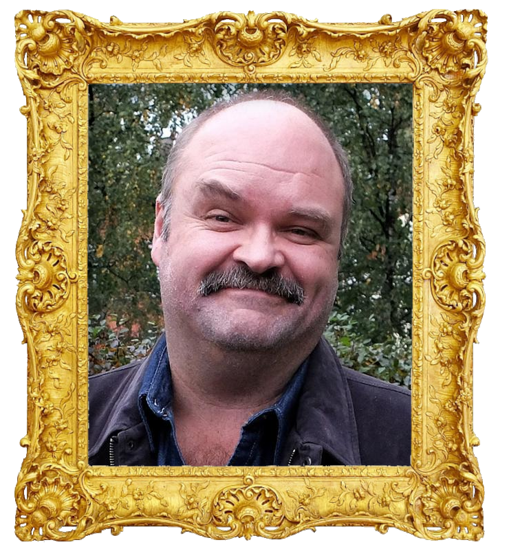 Headshot photo of Atle Antonsen surrounded with an ornate golden frame.
