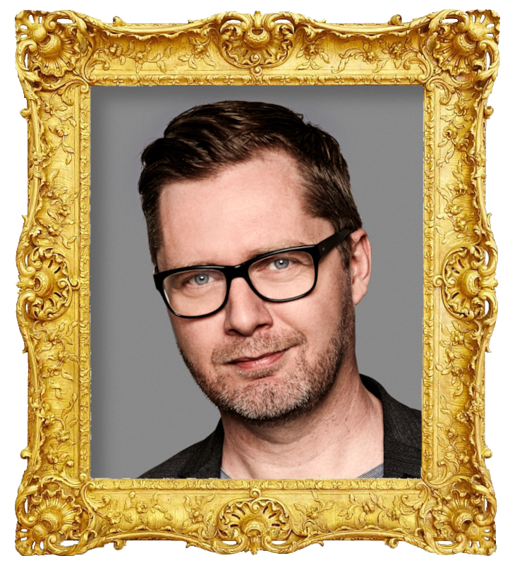 Headshot photo of Lasse Rimmer surrounded with an ornate golden frame.