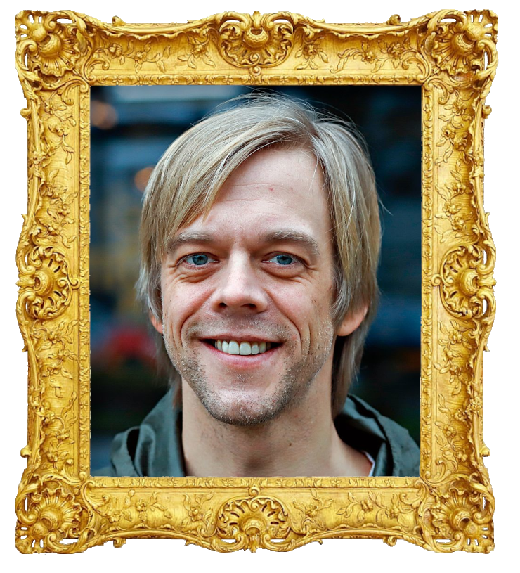 Headshot photo of Calle Hellevang-Larsen surrounded with an ornate golden frame.