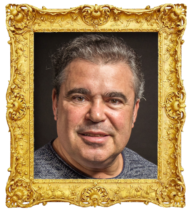 Headshot photo of António Ferrão (aka Toy) surrounded with an ornate golden frame.