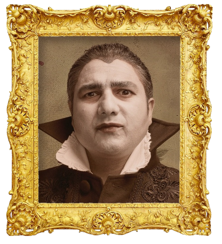 Headshot photo of Nick Mohammed surrounded with an ornate golden frame.