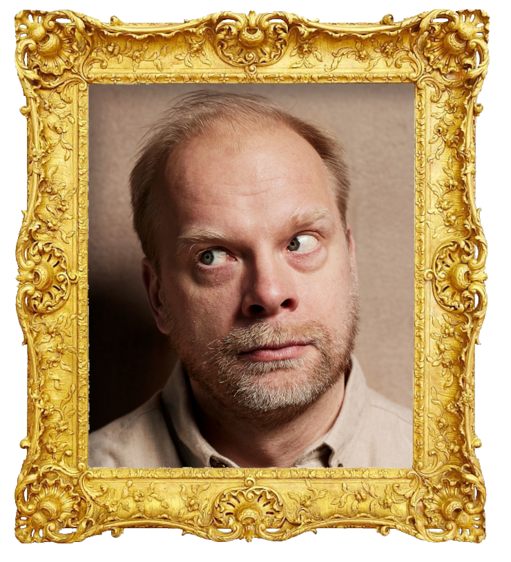 Headshot photo of Ville Myllyrinne surrounded with an ornate golden frame.