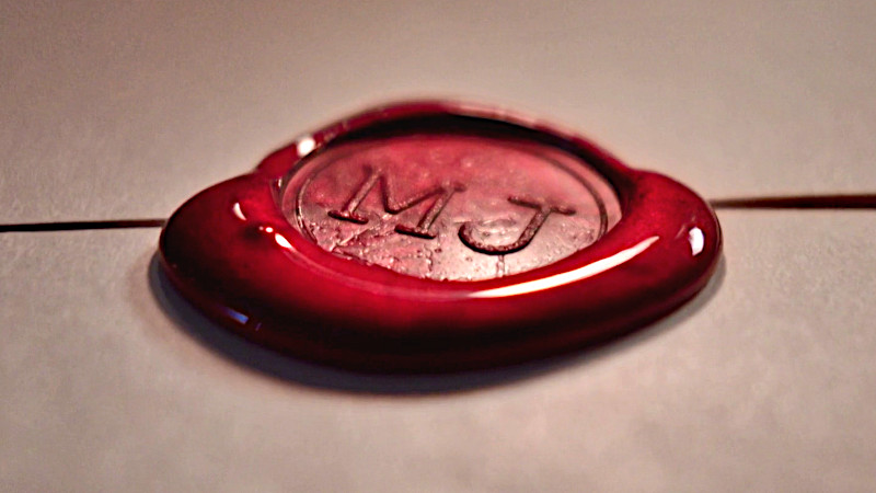 Image of the wax seal used on Le Maître du Jeu