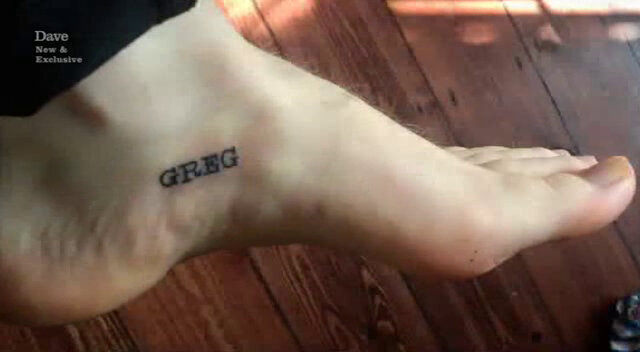 A better quality image of Josh’s foot tattoo, which reads ‘GREG’ in a typewriter font.