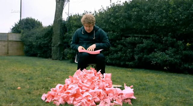 Image of Josh Widdicombe spending most of his allotted 20 minutes constructing a crumpled paper crash mat which ultimately serves no purpose.