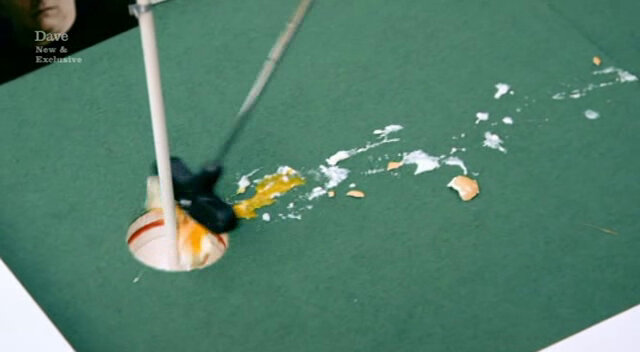 Image showing the messy results of Josh Widdicombe’s failure to sufficiently boil his mini golf eggs.