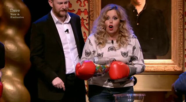 Image showing Roisin Conaty attempting to justify the mathematics of her plan before dumping the entire bowl of Smarties into her empty bowl.