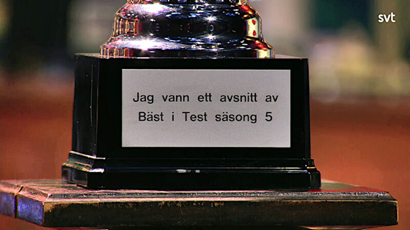Image of the prize up for grabs in this episode: a trophy engraved with the text 