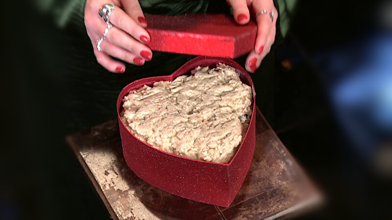 Image of the prize up for grabs in this episode: a heart-shaped box full of baba ghanoush.