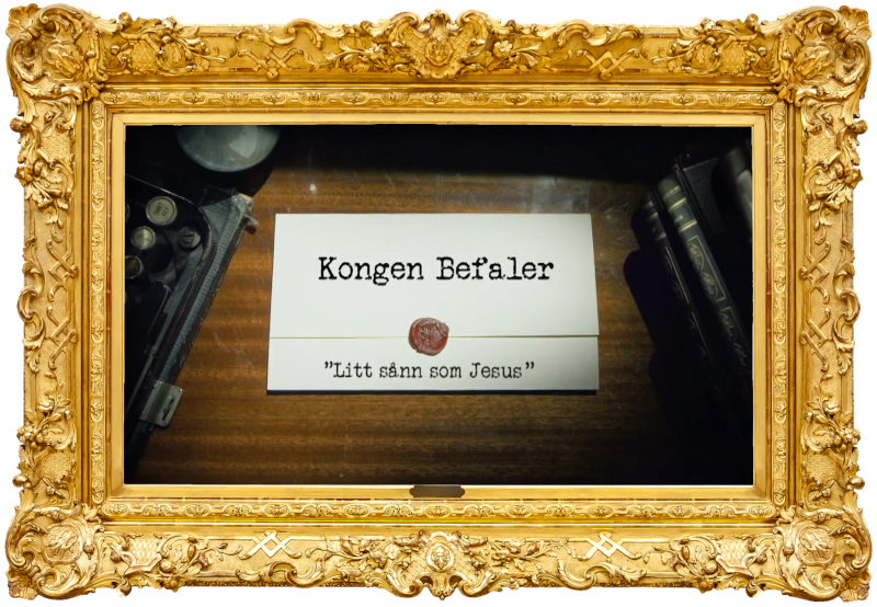 Image of the title card at the start of this episode, showing a task brief with the show title, 'Kongen Befaler', and the episode title, 'Litt sånn som Jesus' ['A bit like Jesus'], on a wooden desk. At the edges of the image, part of a typewriter keyboard and a stack of leather-bound books can be seen.