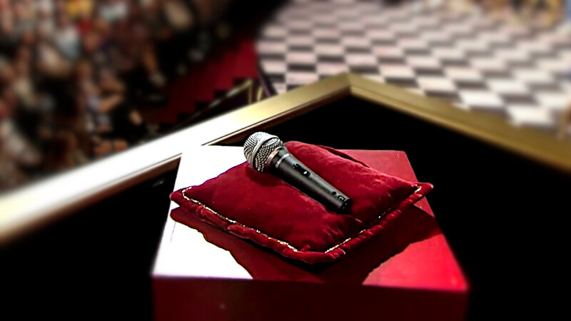 Image of the prize up for grabs in this episode: five minutes of microphone time during Simon Talbot's new stand-up show.