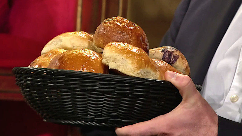 Image of a basket full of home-made buns that Mark claims to have made using the leftover dough from the ‘Create a work of art out of bread dough’ task.