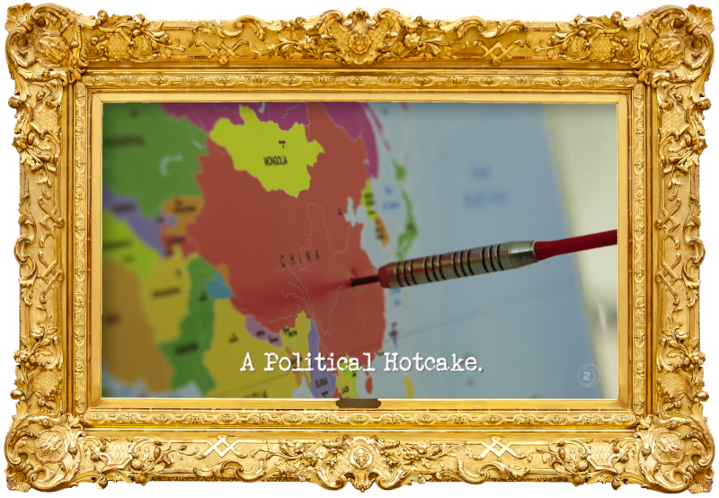 Image of a map of the world, with a dart sticking out of China (a reference to the 'Write and perform a national anthem' task), with the episode title, 'A political hotcake', superimposed on it.
