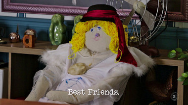Image of a stuffed fabric dummy sat in a chair (a reference to the 'Turn a dummy into your best friend' task), with the episode title, 'Best friends', superimposed on it.