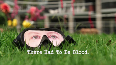 Image of a pair of goggles with Karen O'Leary's eyes printed on the front (a reference to the 'Direct your team-mate through the maze' task), with the episode title, 'There had to be blood', superimposed on it.