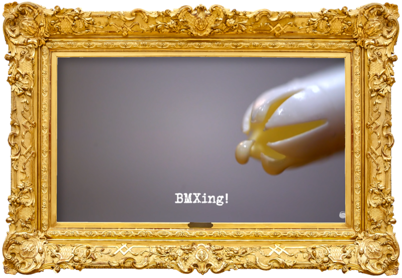 Image of the plastic nozzle of a can of squirty cream (a reference to the 'Make the best squirty cream art' task), with the episode title, 'BMXing!', superimposed on it.