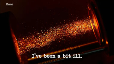 Image of what appears to be dust caught in a shaft of light (presumably a reference to the 'Make a delicious dust meal' task), with the episode title, 'I’ve been a bit ill', superimposed on it.