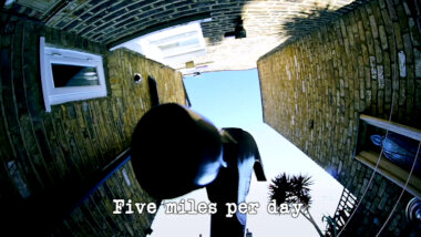 Image taken from the ground, and looking up at the head of a hammer (presumably a reference to either the 'Build a robust statue of a delicate thing' task and/or the 'Break something and put it back together' task), with the episode title, 'Five miles per day', superimposed on it.
