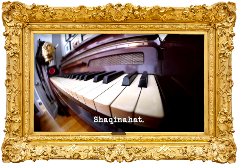 Distorted wide angle image of a piano keyboard, with a Taskmaster trophy visible at its far end (a reference to the 'Write and perform lyrics for the Taskmaster theme tune' task, and possibly also the 'Supply a soundtrack for a film' task), with the episode title, 'Shaqinahat', superimposed on it.