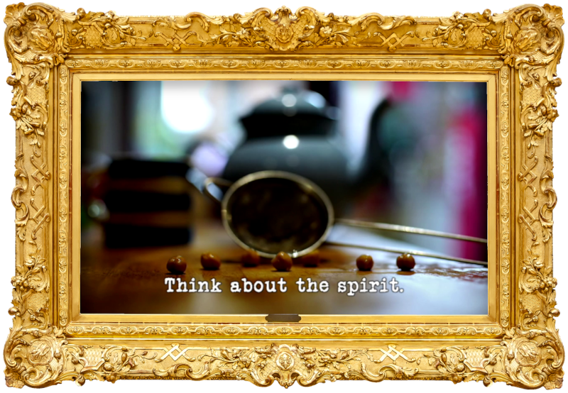 Image of six chickpeas on a wooden surface, in front of a small sieve (a combined reference to both the 'Do the most preposterous thing with a chickpea' task and the 'Make a cup of tea' task), with the episode title, 'Think about the spirit', superimposed on it.