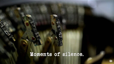 Image of the typebars of a typewriter (presumably a reference to the 'Learn your lines and perform a scene' task), with the episode title, 'Moments of silence', superimposed on it.