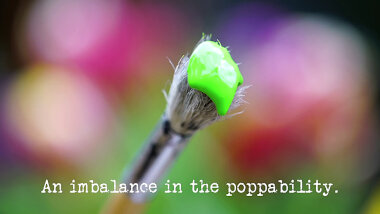 Image of a blob of bright green paint on the end of a paintbrush (a reference to the 'Paint a flattering picture of the Taskmaster in action' task), with the episode title, 'An imbalance in the poppability', superimposed on it.