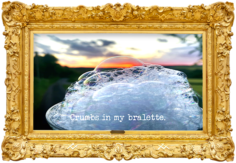 Image of a foam of soap bubbles against a sunset (a reference to the 'Turn on the bubble machine' task), with the episode title, 'Crumbs in my bralette', superimposed on it.