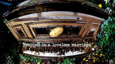 Photo of a potato laid on a dilapidated piano (a reference to both the 'Build a bridge over the red green for this potato' and 'Compose and perform a musical solo' tasks), with the episode title, 'Trapped in a loveless marriage', superimposed on it.