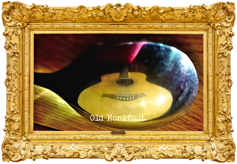 Photo of an guitar reflected in the convex side of a spoon (a reference to the 'Musical Simon Says' and 'Salvage the most spoons' tasks), with the episode title, 'Old Honkfoot', superimposed on it.