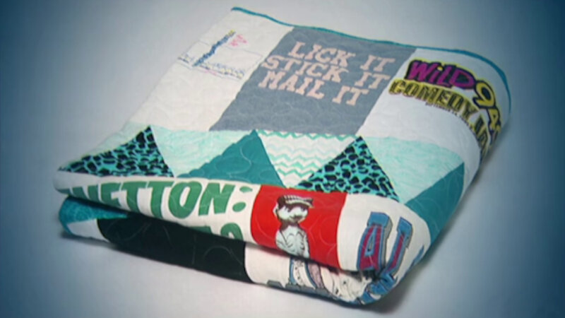 Image of the prize up for grabs in this episode: Lisa Lampanelli’s quilt made of tour t-shirts from her comedy career.