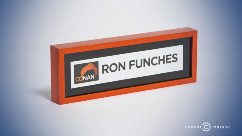 Image of the prize up for grabs in this episode: Ron Funches’ dressing room name plate from his first appearance on Conan.