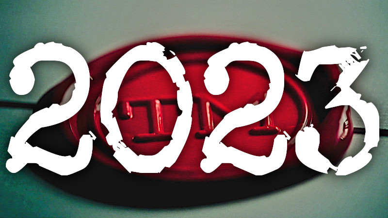 Image of the Taskmaster wax seal with the year 2023 superimposed on it in large, typewriter-font numbers.