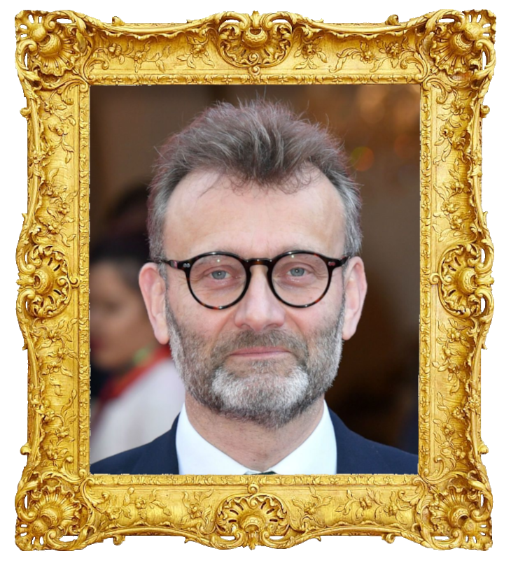 Headshot photo of Hugh Dennis surrounded with an ornate golden frame.