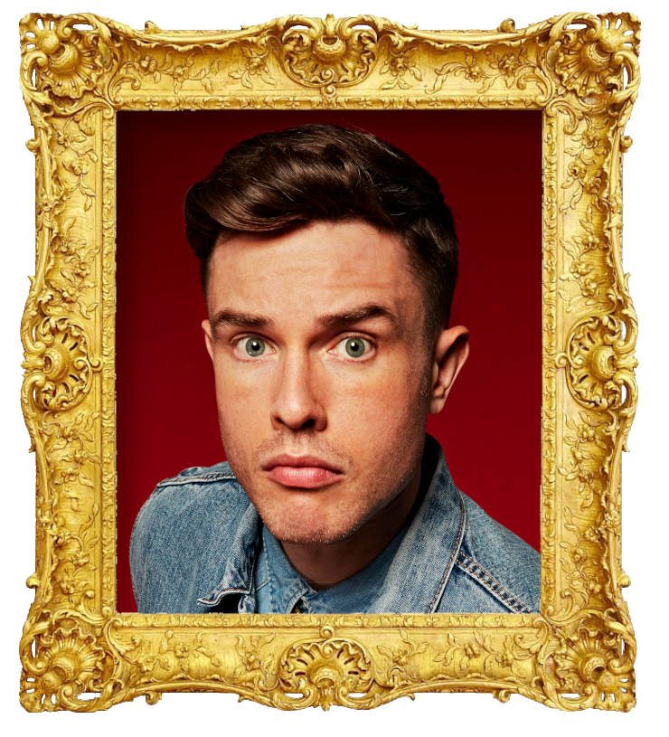 Headshot photo of Ed Gamble surrounded with an ornate golden frame.