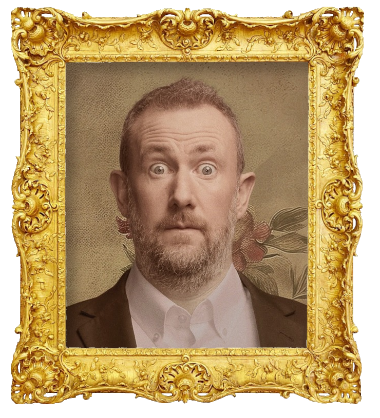 Headshot photo of Alex Horne surrounded with an ornate golden frame.