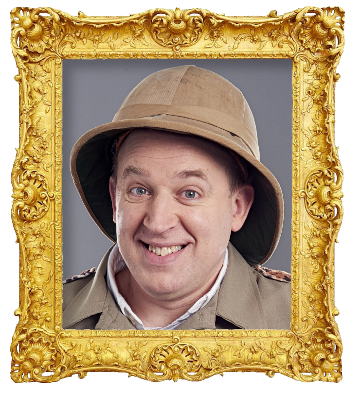 Headshot photo of Tim Vine surrounded with an ornate golden frame.