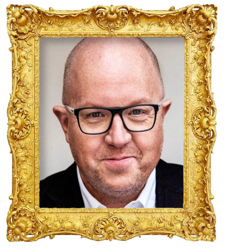 Headshot photo of Anders Jansson surrounded with an ornate golden frame.