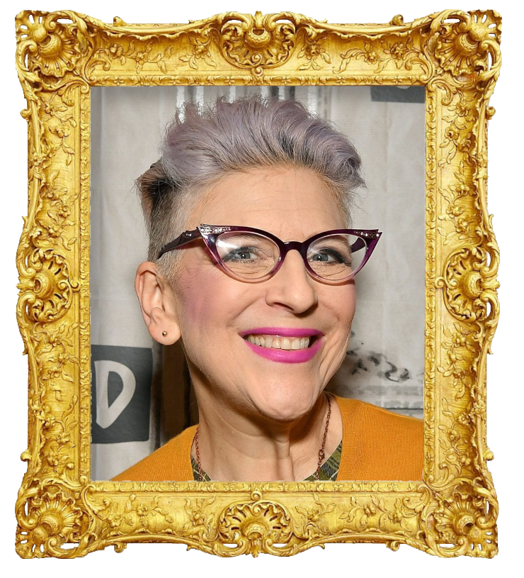 Headshot photo of Lisa Lampanelli surrounded with an ornate golden frame.