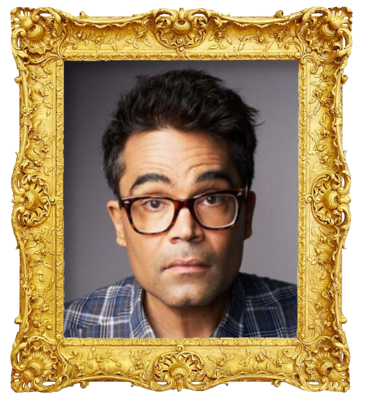 Headshot photo of David Batra surrounded with an ornate golden frame.