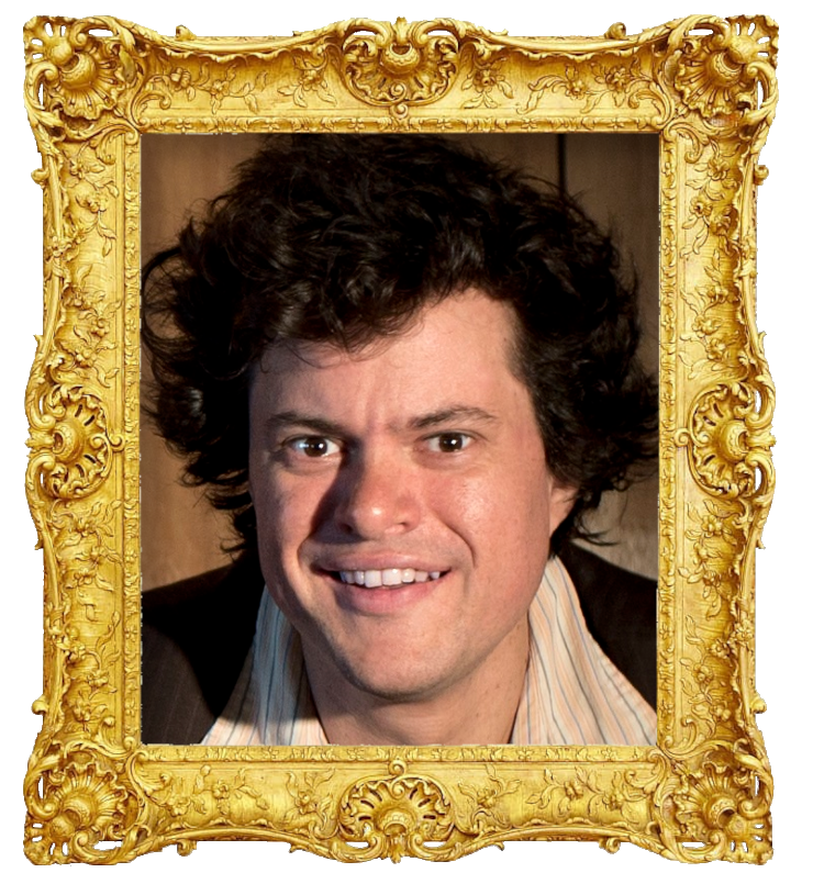 Headshot photo of Dan Atkinson surrounded with an ornate golden frame.