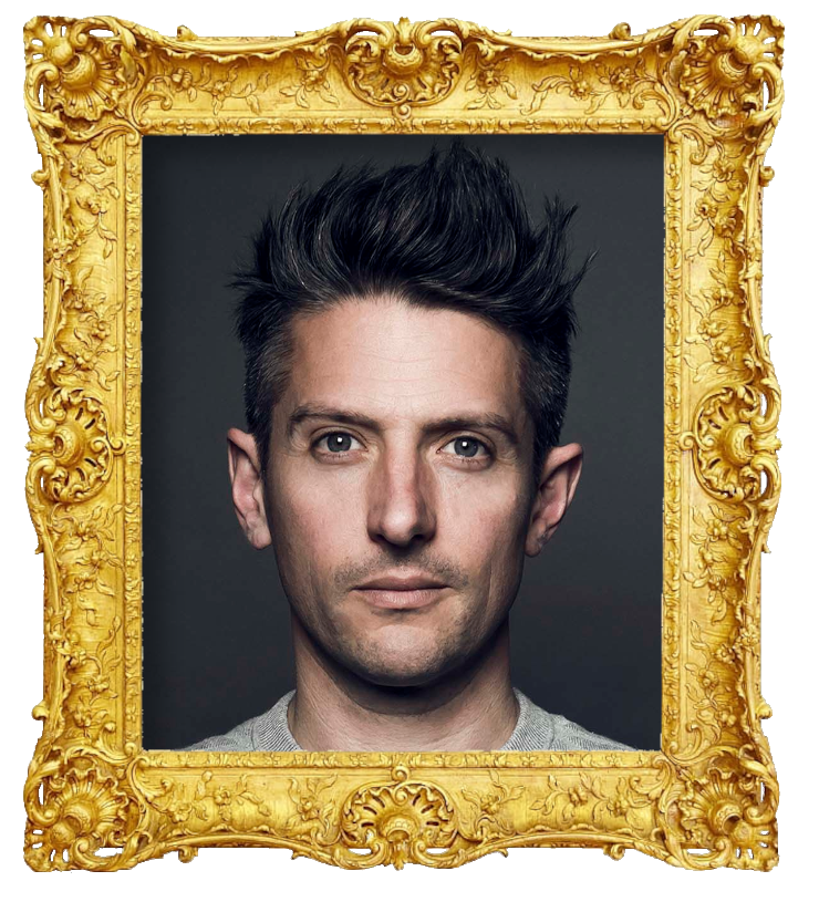 Headshot photo of Stuart Goldsmith surrounded with an ornate golden frame.