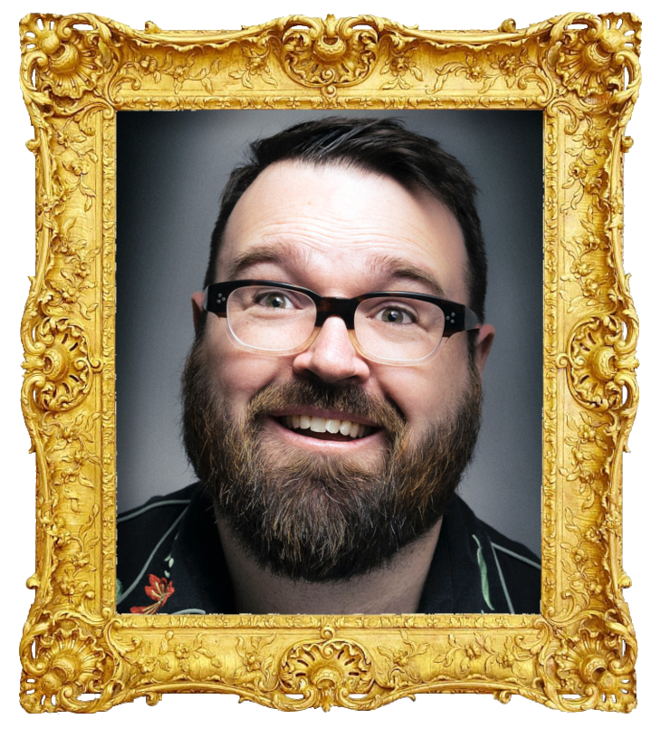 Headshot photo of Jarred Christmas surrounded with an ornate golden frame.