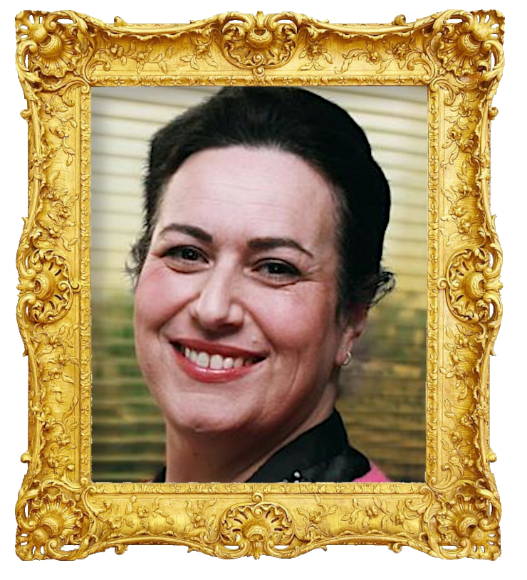 Headshot photo of Claire Zolkwer surrounded with an ornate golden frame.
