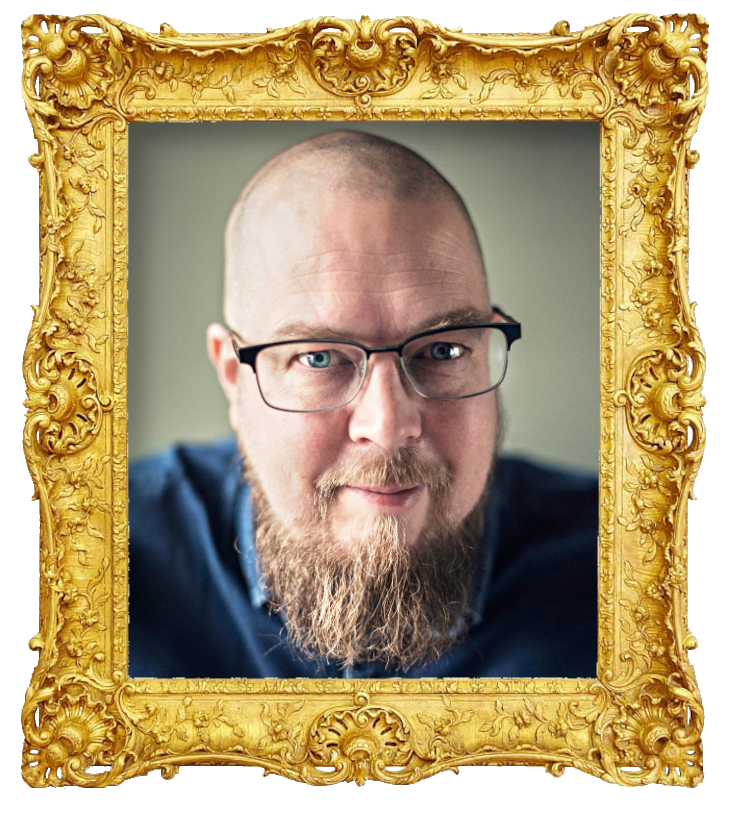 Headshot photo of Tuomas Kyrö surrounded with an ornate golden frame.