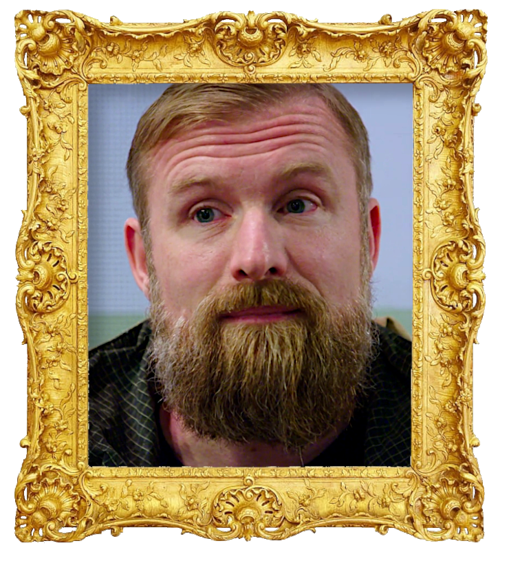 Headshot photo of Trausti Evans surrounded with an ornate golden frame.