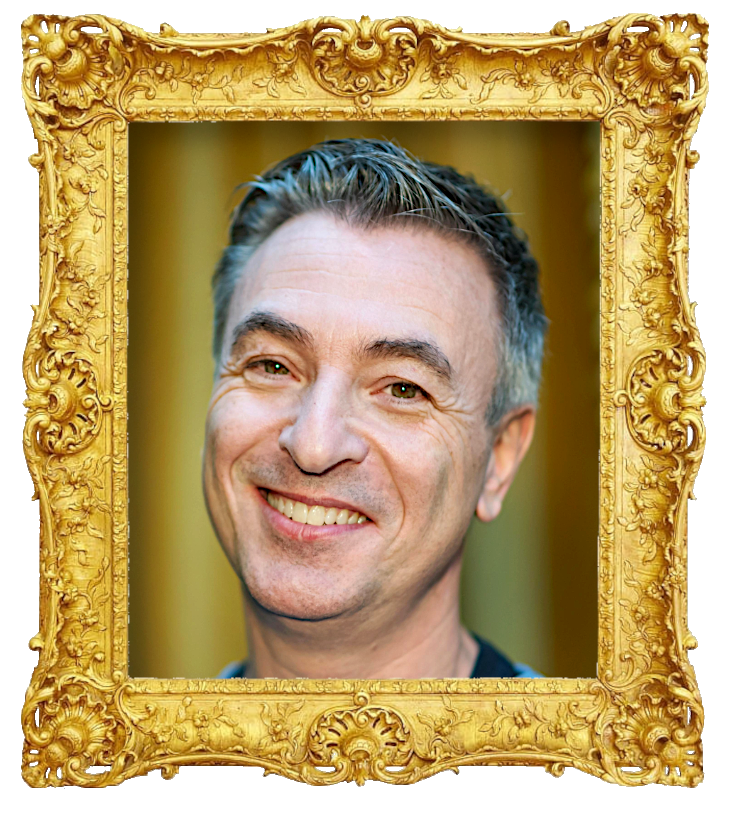 Headshot photo of Tareq Taylor surrounded with an ornate golden frame.
