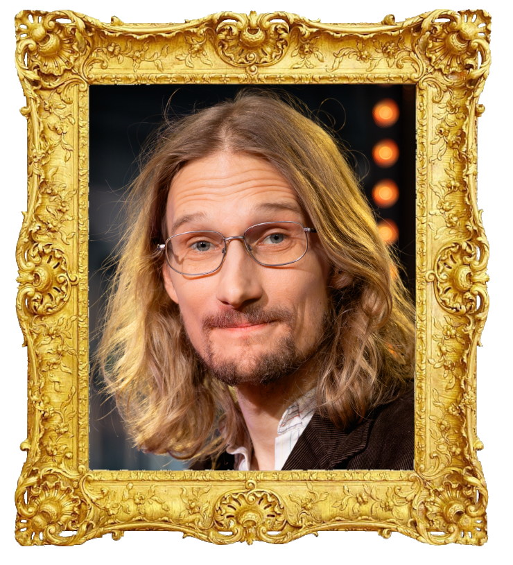 Headshot photo of Marcus Berggren surrounded with an ornate golden frame.