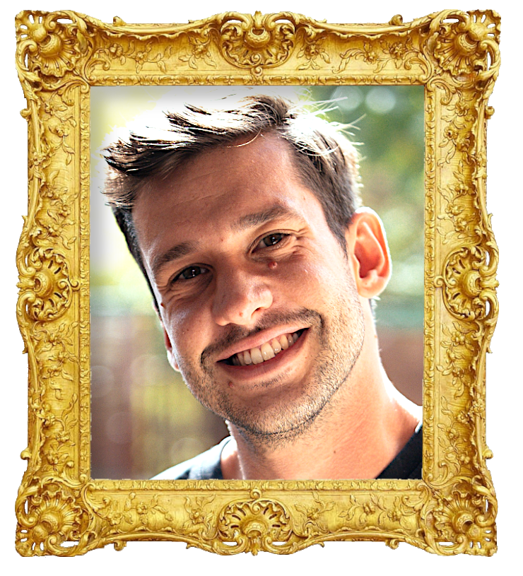 Headshot photo of Ante Travizi surrounded with an ornate golden frame.