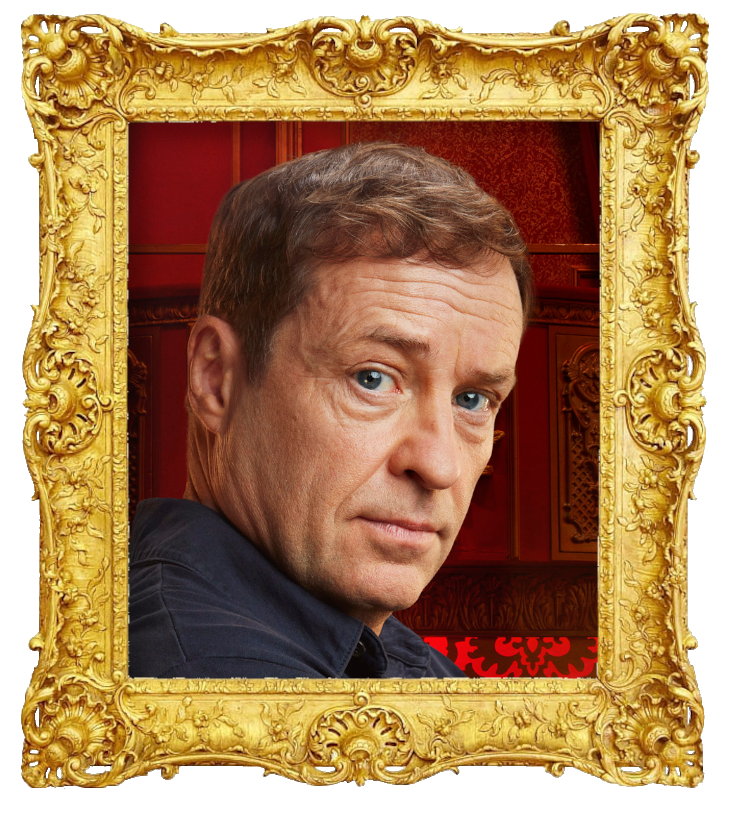 Headshot photo of Ardal O'Hanlon surrounded with an ornate golden frame.