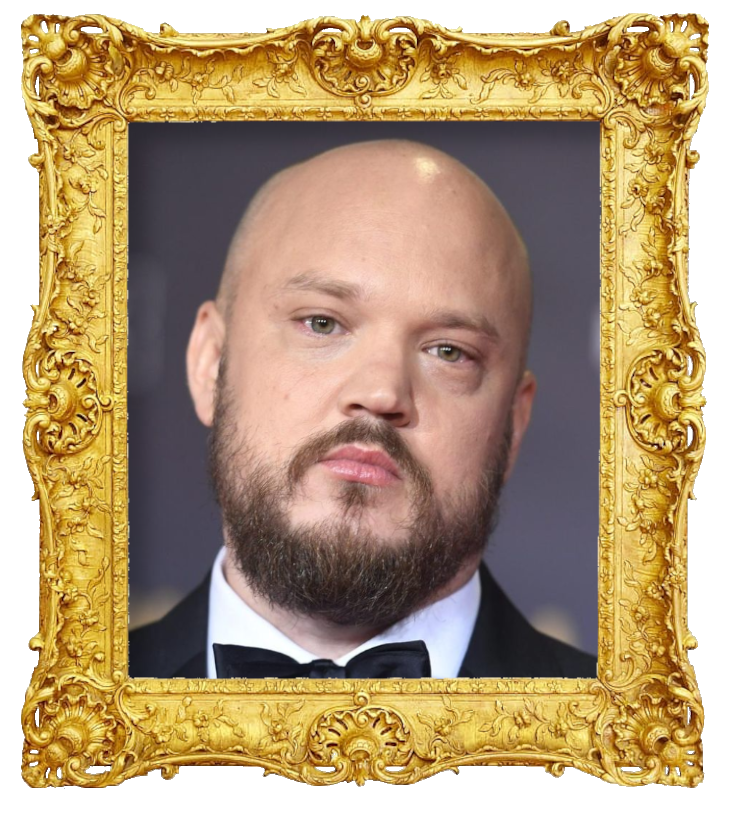 Headshot photo of Mikko Kuoppala (aka Pyhimys) surrounded with an ornate golden frame.